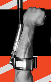 Red and white diagonal stripes at the top and bottom of the image. In the middle is a thick, black horizontal bar. There is a muscular, male arm and hand holding a forearm crutch. The arm is raised as in a fist with the crutch pointing triumphantly upward.