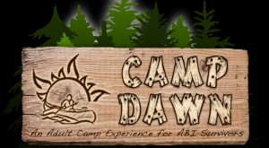 Logo on wood in front of trees shows someone canoeing at sunrise and text "Camp Dawn: Adult Camp Experience for ABI Survivors"
