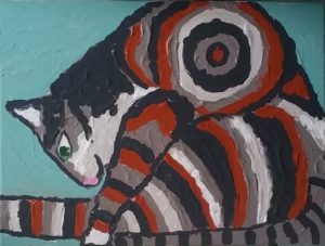 A stylized red, white, gray, and black classic tabby cat sits on his rump with back legs extended, leans over, and stares intently at his tail in focused stillness.