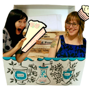 Image Description courtesy of CACE: A smiling Taiwanese woman with two fingers on each hand holds a big cartoon piece of cake. A smiling white woman with a tortoise tattoo is wearing a cupcake hat. The two women are popping out of a vintage recipe box.